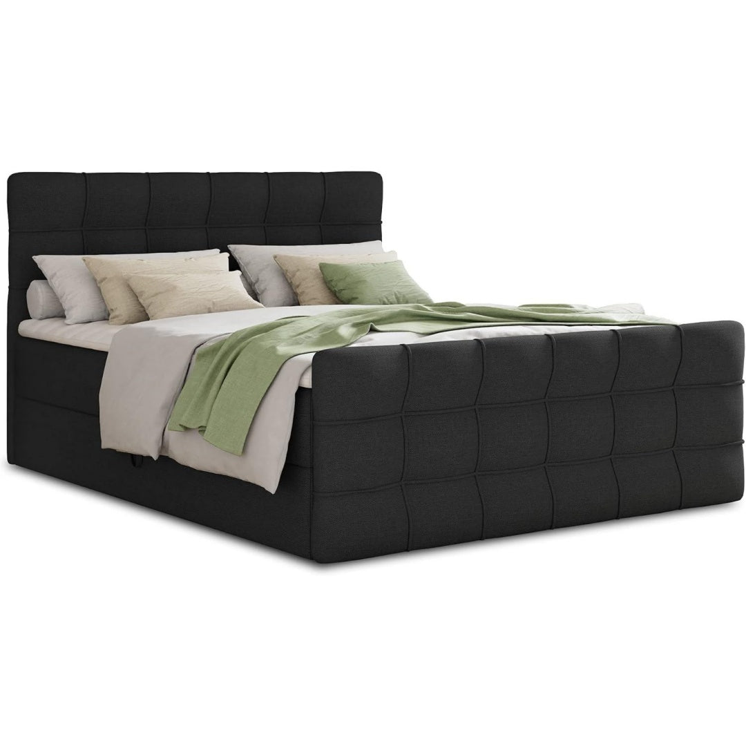 Eine Fussauflage an dem Boxspringbett